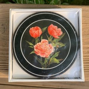 Set of 6 round coasters made in England. Peony design on black. Un-opened